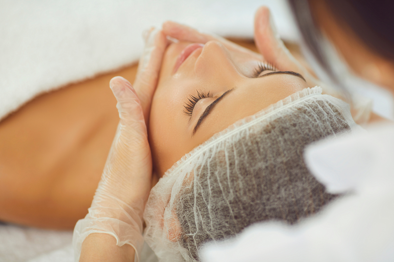 Woman Face Skin Massage Treatment in Cosmetic Spa Beauty Salon
